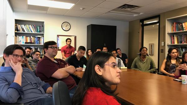 A group of people in a friday talk